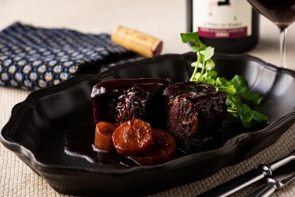 煮汁はこして⑤にかける。